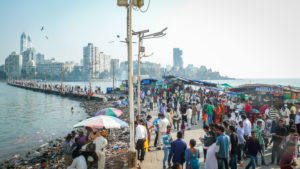 Street scene in front of skyline, Mumbai, Maharashtra state, India Street scene in front of skyline, Mumbai, Maharashtra state, India